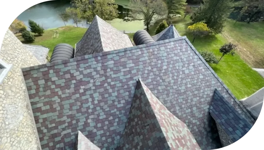 A multi-colored tile roof by ABC Roofing.